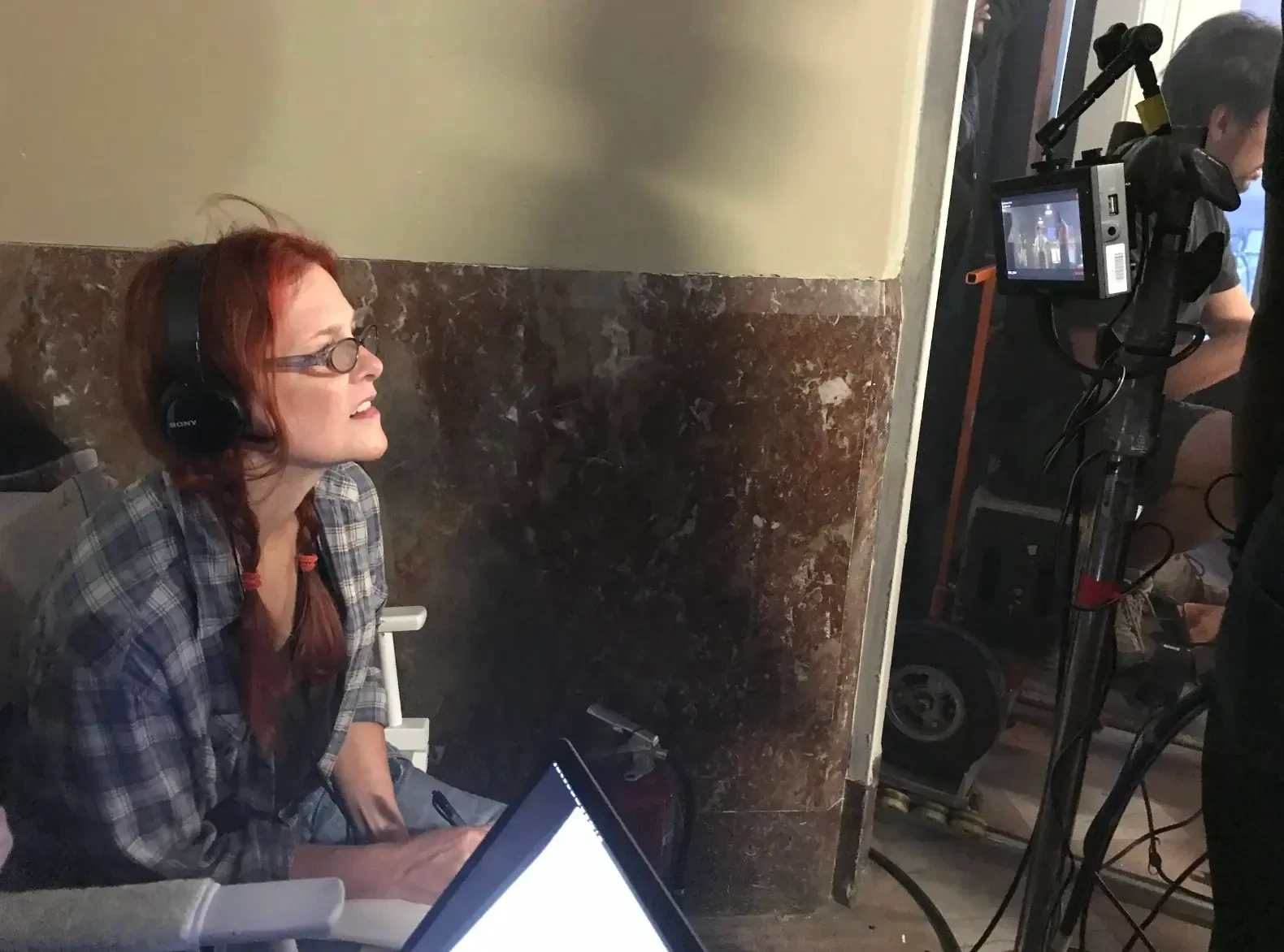 Anne Welles reviewing playback on the monitor