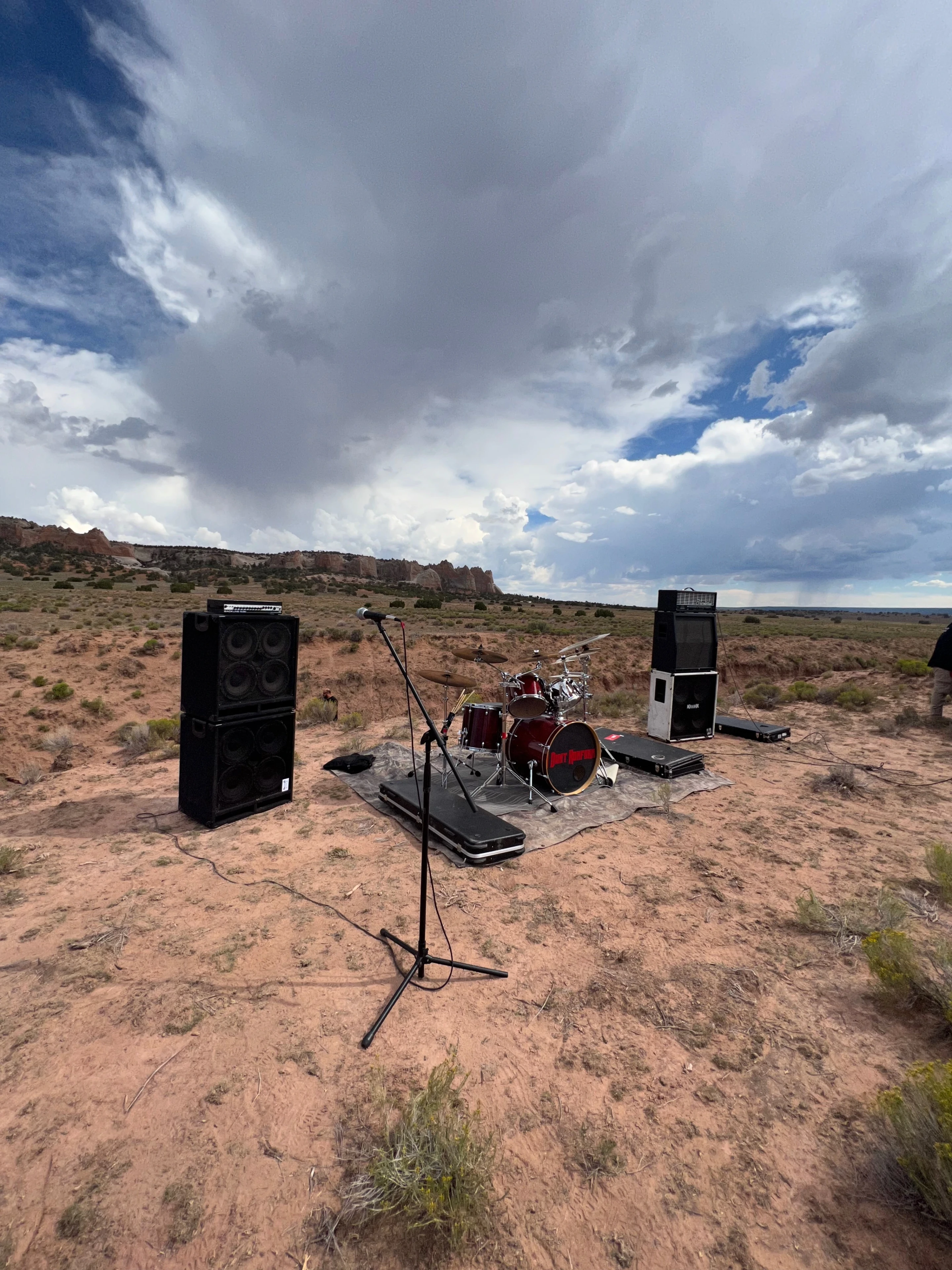 Band instruments set up in the desert — F**k Your Face